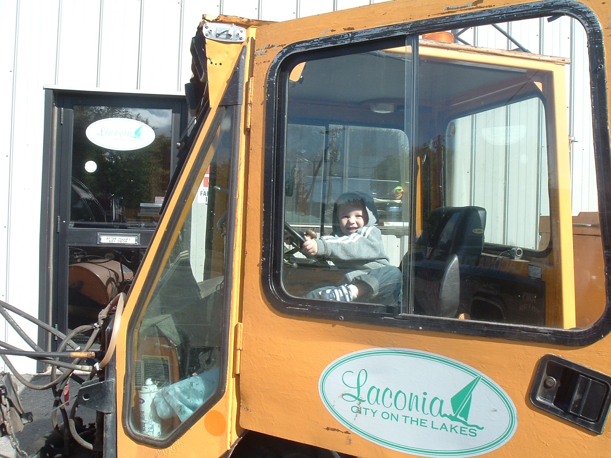 Child enjoying the Touch a Truck event hosted by the DPW